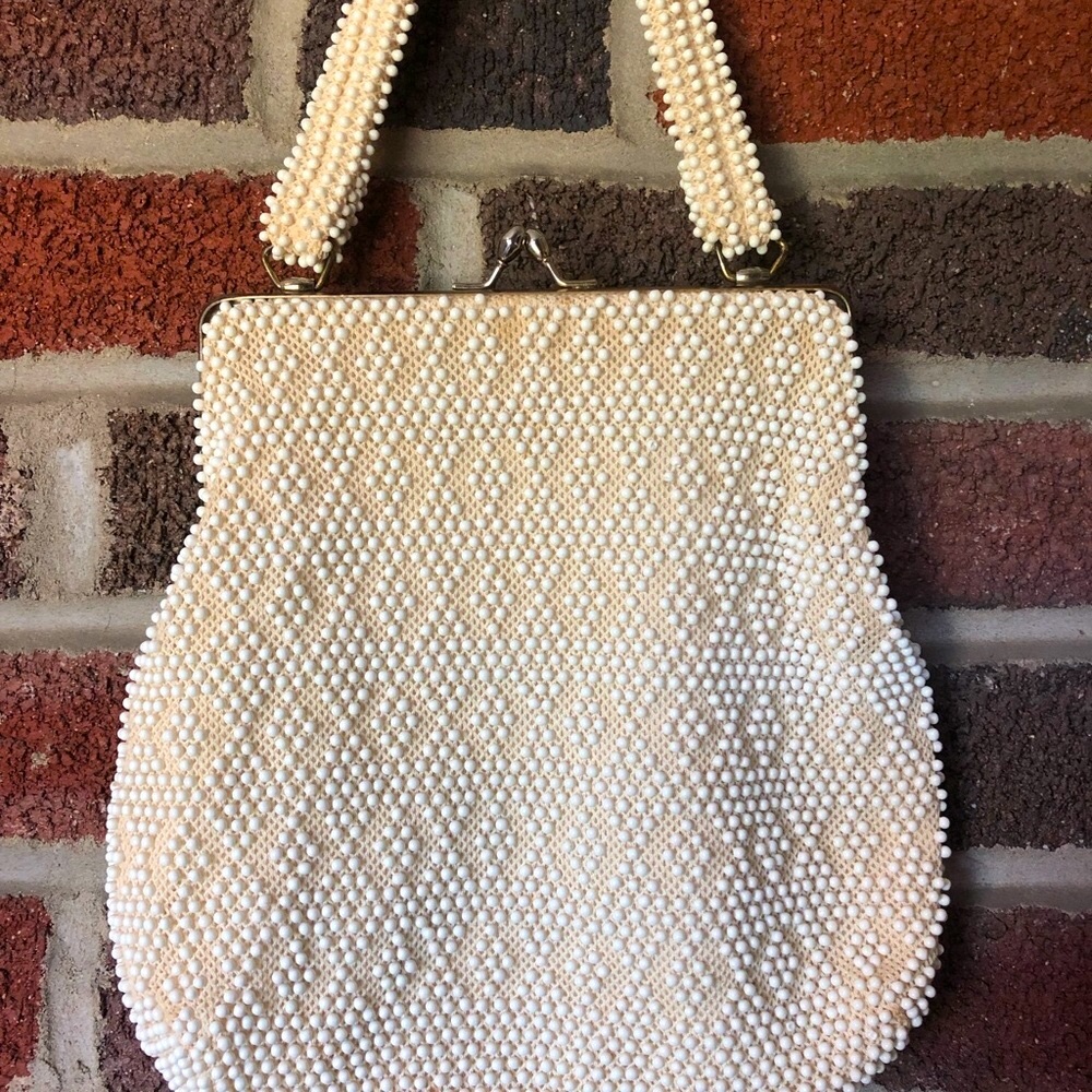 White beaded metal framed ball clasp evening bag